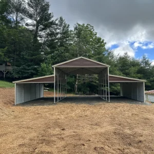 A sturdy 20×25 steel barn with customizable lean-tos, built with 14-gauge steel framing and 29-gauge panels, offering weather-resistant storage, workspace, or agricultural use.