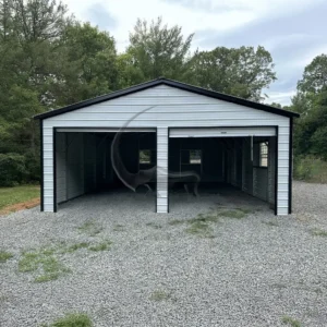 24x30 steel garage with 14-gauge frame, 29-gauge panels, 2 roll-up doors, walk-in door, and 3 windows. Fully enclosed sides and ends for durability and versatility."