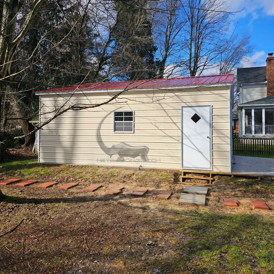 24x25 enclosed steel garage with 14-gauge steel frame, 29-gauge panels, 2 roll-up doors (10x8), a walk-in door (36x80), and 2 windows (30x36). Designed for durability and versatility in residential, commercial, or agricultural applications."