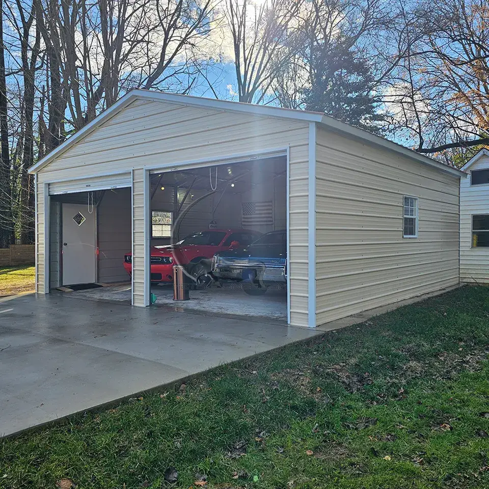 24x25 enclosed steel building with 14-gauge steel frame, 29-gauge panels, 2 roll-up doors (10x8), a walk-in door (36x80), and 2 windows (30x36). Designed for durability and versatility in residential, commercial, or agricultural applications."