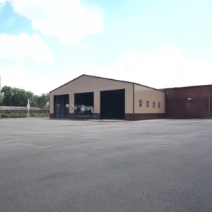 58x60 Metal Building with Vertical Roof Style and Two-Tone Finish